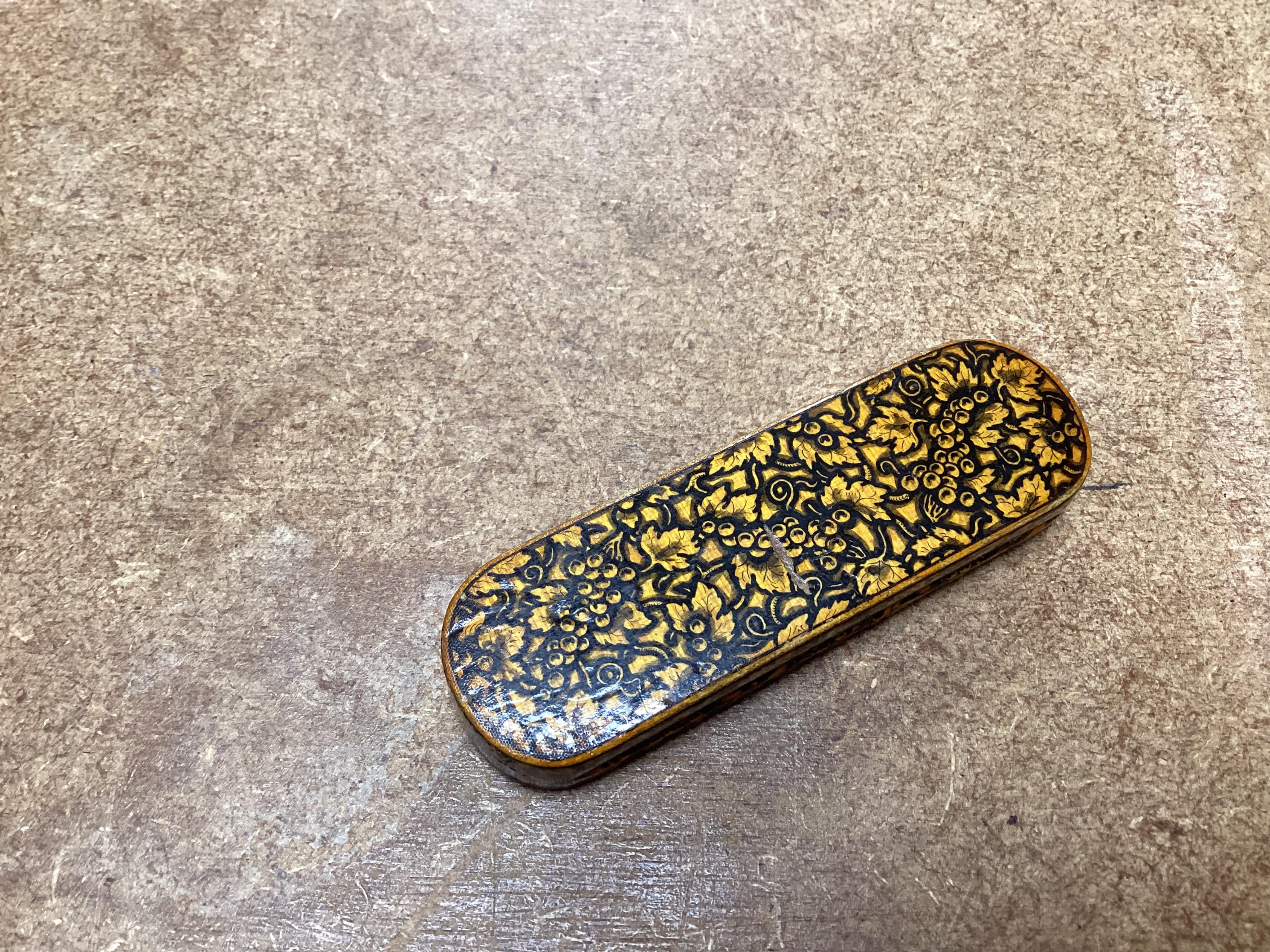 An early Mauchline ware penwork 'hunting' toothpick case, 7cm in length